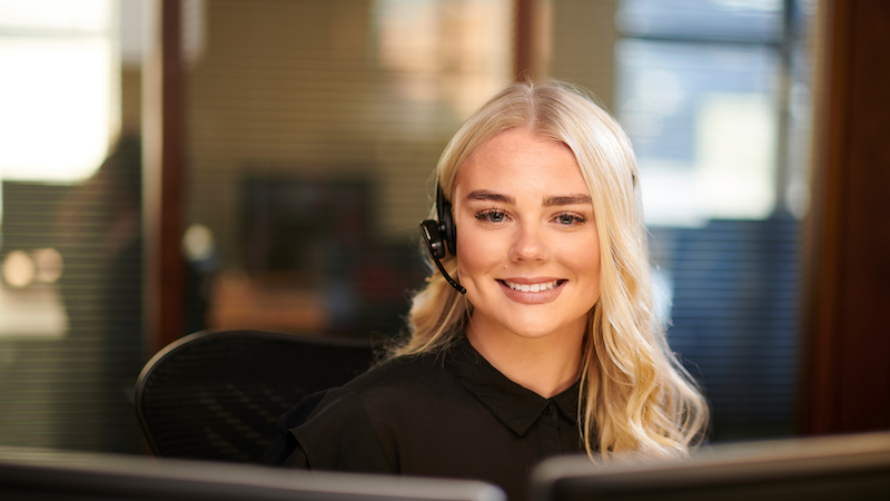 Customer service agent on a call with headset