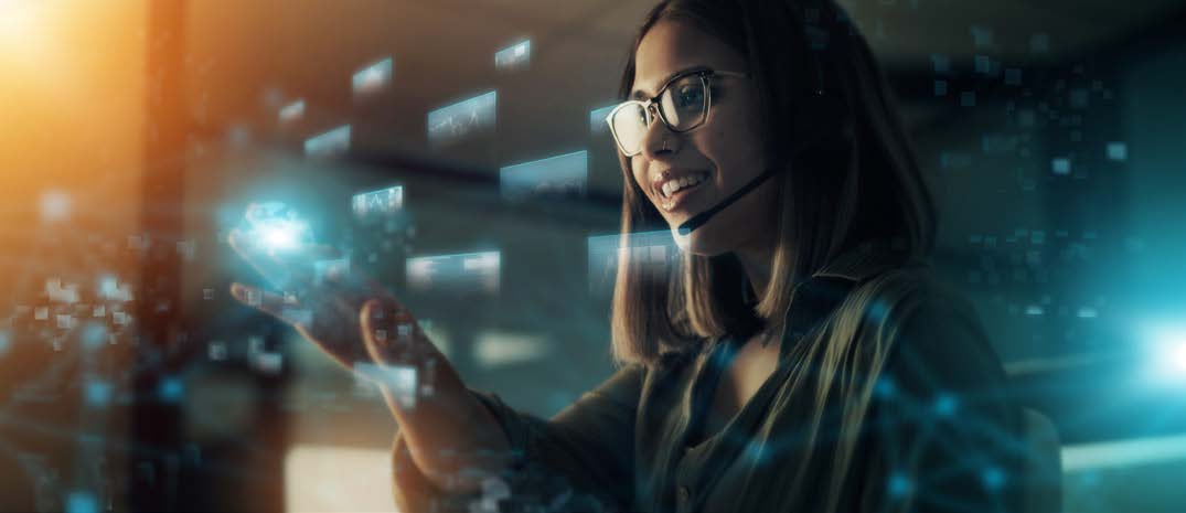Customer service professional with a headset and digital interface.
