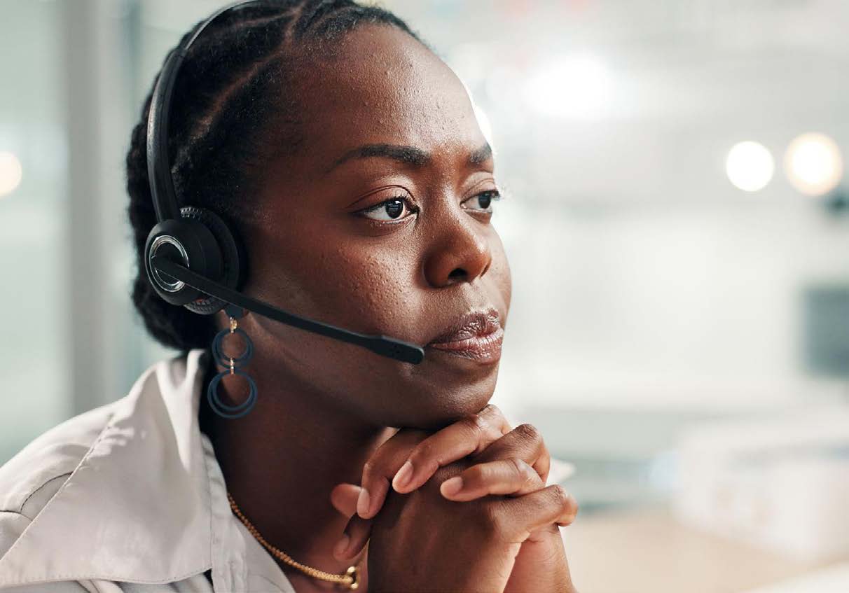 Customer service professional wearing a headset.