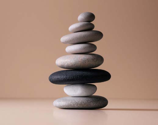 A balanced stack of smooth stones.